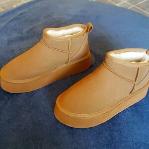 Platform booties, size 8, man made upper and sole. NWOT
